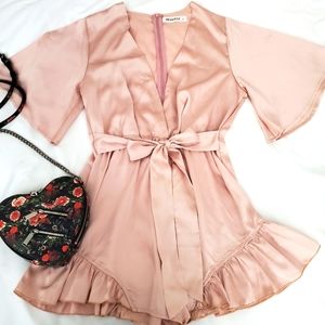 NWOT Reverse Pink Satin Romper